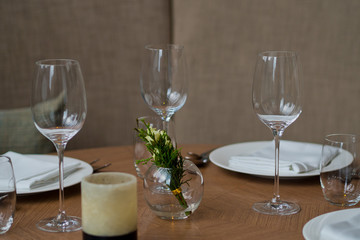 Empty glasses wine in restaurant. Glass water. Dish spoon fork on table