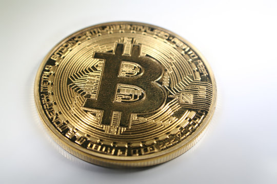Golden Bitcoin With White Background
