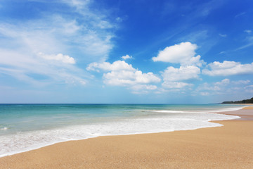 Fototapeta na wymiar tropical andaman seascape scenic off sandy beach phuket thailand with wave crashing on sandy shore.