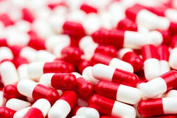Selective focus of antibiotic capsules pills on blur background with copy space. Drug resistance concept. Antibiotics drug use with reasonable and global healthcare concept.