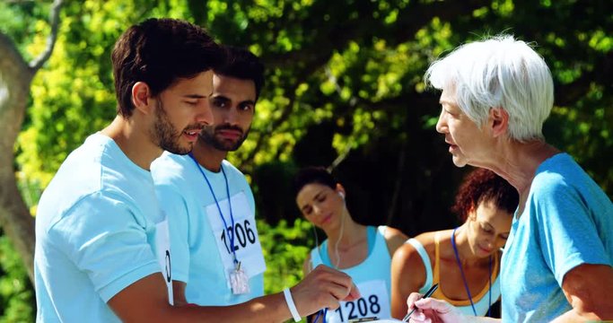 Athletes registering themselves for marathon 