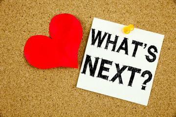 Hand writing text caption inspiration showing Question What's Next concept meaning What is Next Self-Development Improvement Love written on sticky note, reminder isolated background with copy space
