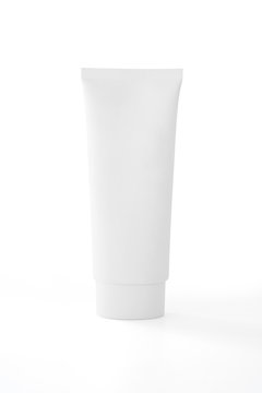 White cosmetic tube pack of cream or gel isolated on white background .