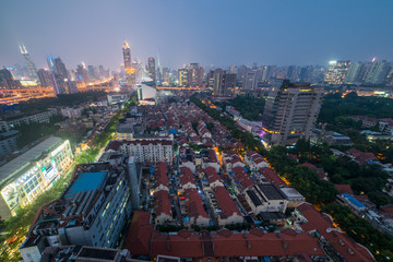 Fototapeta na wymiar Aerial Night View During the Blue Hour of Modern and Old Buildings of Downtown Shanghai, China