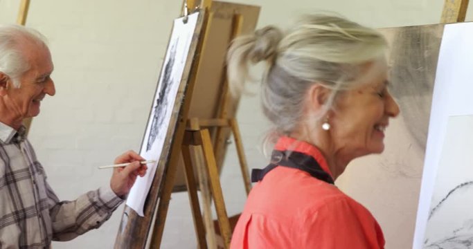 Artist drawing sketch on canvas 