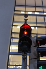 traffic lights and facades near train station