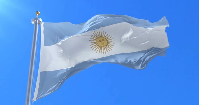 Argentina flag waving at wind in blue sky, loop