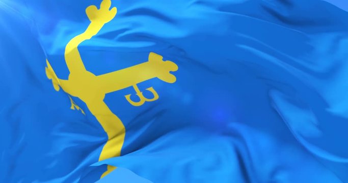 Asturian flag, of Asturias, spanish region of Spain, waving at wind in slow with blue sky, loop