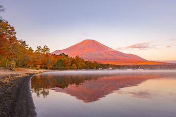 Fototapeta premium Autumn at Lake Yamanaka – Colorful Leaves and Mt. Fuji at Sunset
