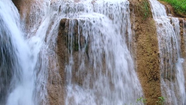 Seamless video, Beautiful green waterfall in the nature. "Than sawan waterfall, Payao, Thailand"