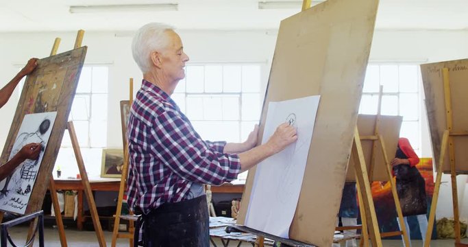 Artists drawing sketch on canvas 