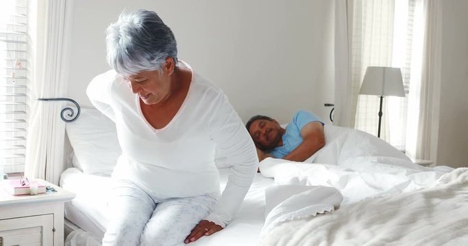 Senior woman suffering from back pain 