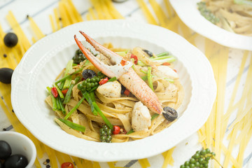 Spicy Seafood Spaghetti on a white ceramic dish