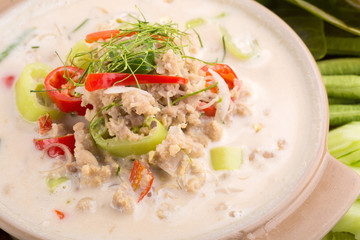 Simmer soft crab boiled in coconut milk with fresh vegetables, Thai flavors food, isolated on white background