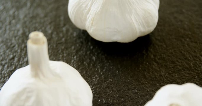Garlic on black background 