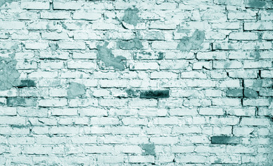 Old weathered brick wall pattern in cyan toned