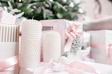 Obraz na płótnie Canvas Christmas Gifts under the tree. Concept New Year celebration background.