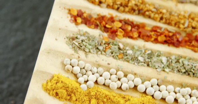 Various spices arranged in tray 
