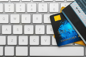 Credit cards on computer keyboard, closeup