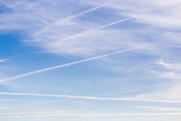 traces of an airplane on a blue sky