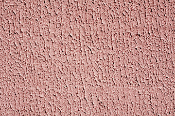 Red color plaster wall texture.