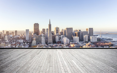 Obraz premium empty brick floor and modern cityscape