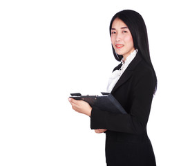 smiling business woman in suit holding a clipboard isolated on white background