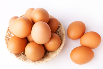 Top view Eggs in the basket on White Background