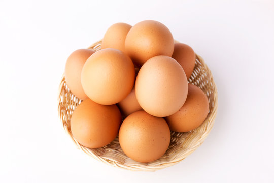 Top view Eggs in the basket on White Background