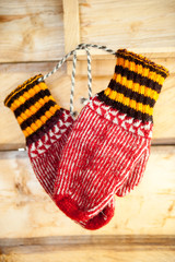 Hand knitted and hand painted glowes from natural wool