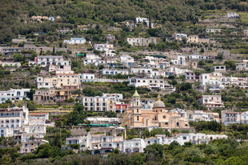 Fototapeta na wymiar Exclusive villas and hotels on the rocky coast of Amalfi. Campania. Italy