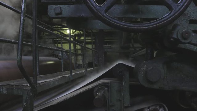 Closeup of old vintage machine for pulp production during process.	