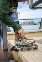 Young woman on roller skates in the park