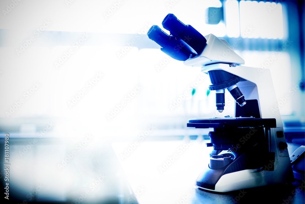 Poster composite image of microscope in laboratory