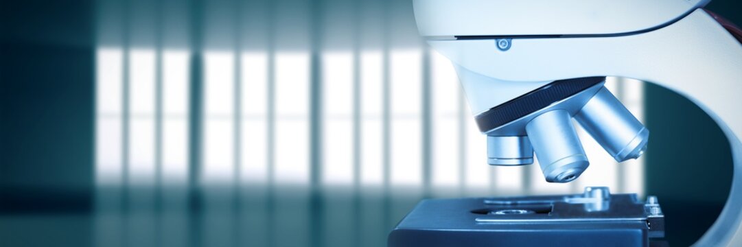 Composite image of microscope in laboratory 