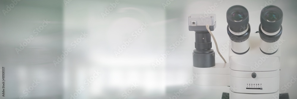 Poster composite image of microscope in laboratory