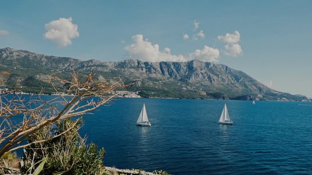 A sailboats the Adriatic sea mountains background island Sv. Nikola