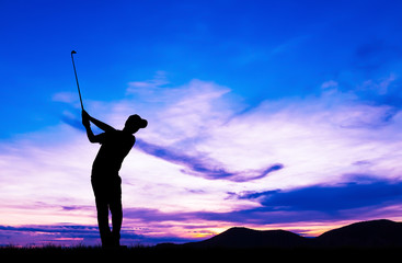 silhouette golfer playing golf during beautiful sunset