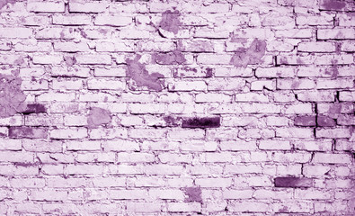 Old weathered brick wall pattern in violet tone