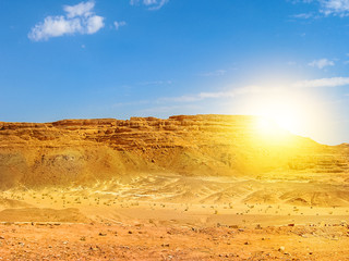 Desert background. Beautiful landscape of spectacular gorge of Colored Canyon, near Mount Sinai and Nuweiba, Sinai Peninsula in Egypt. Sunset light with copy space.