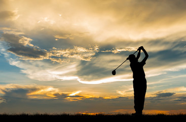 silhouette golfer playing golf during beautiful sunset