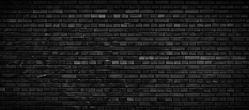 Black brick wall background.