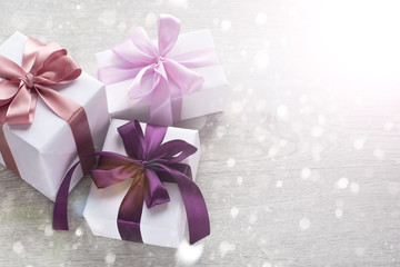 Gift boxes decorated with satin ribbon.
