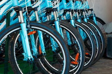 Many identical bicycles in a row