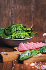 sausage with fresh spinach