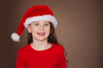 happy little girl with santa hat