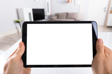 Obraz na płótnie Canvas Human Hand Using Digital Tablet