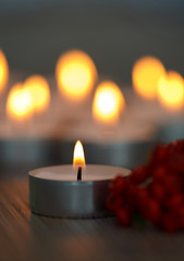 Many small burning candles