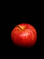 red apple isolated on black background