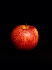 red apple isolated on black background
